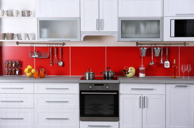 modern kitchen with red splashback