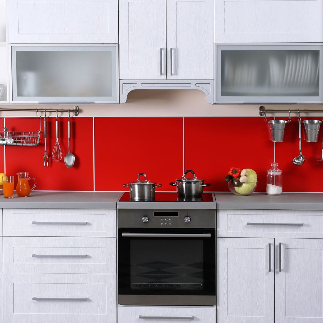 modern kitchen with red splash back
